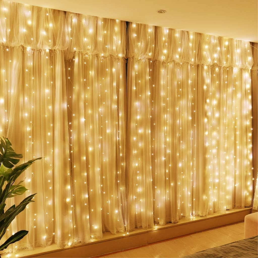 Fairy Curtain Lights, Amazertec 300 LED Window Curtain String Light Wedding Party Home Garden Bedroom Outdoor Indoor Wall Decorations (Warm White)